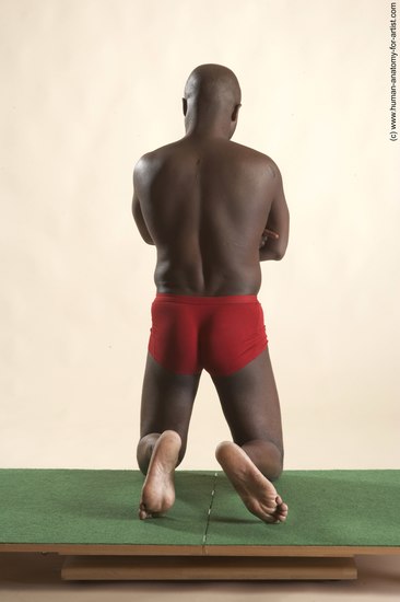 Underwear Man Black Kneeling poses - ALL Average Bald Kneeling poses - on both knees Academic