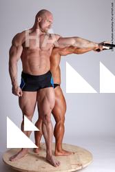 Swimsuit Fighting with gun Man - Man White Standing poses - ALL Muscular Bald Brown Standing poses - simple Academic