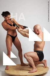 Swimsuit Fighting with gun Woman - Man White Kneeling poses - ALL Muscular Bald Kneeling poses - on one knee Academic
