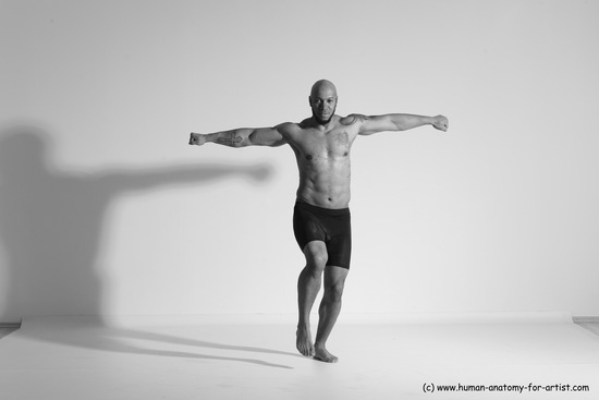 Underwear Gymnastic poses Man Black Muscular Bald Dancing Dynamic poses Academic