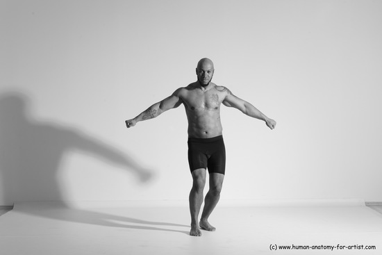 Underwear Gymnastic poses Man Black Muscular Bald Dancing Dynamic poses Academic