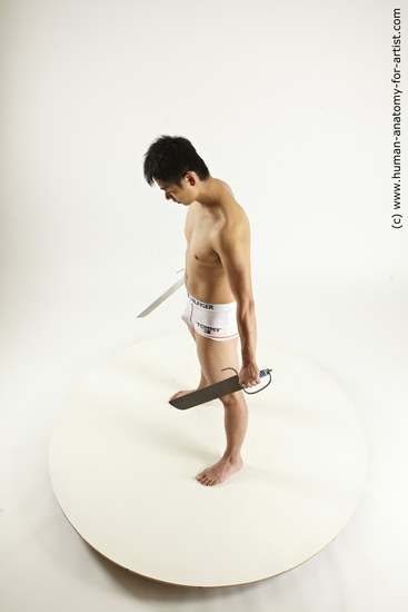 Underwear Fighting with knife Man Asian Average Medium Black Multi angles poses Academic