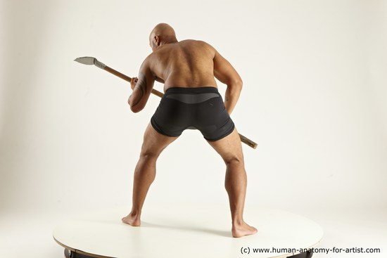 Underwear Fighting Man Black Muscular Bald Multi angles poses Academic