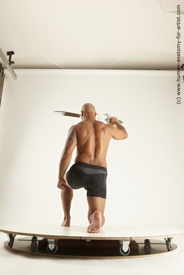 Underwear Fighting with sword Man Black Muscular Bald Multi angles poses Academic