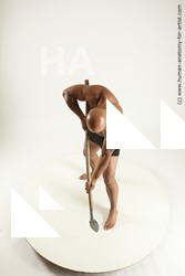 Underwear Fighting with spear Man Black Standing poses - ALL Muscular Bald Standing poses - simple Multi angles poses Academic