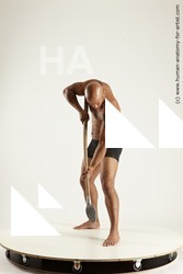 Underwear Fighting with spear Man Black Standing poses - ALL Muscular Bald Standing poses - simple Multi angles poses Academic