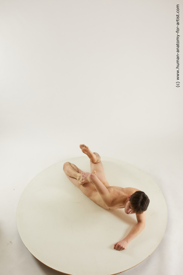 Nude Man White Laying poses - ALL Slim Short Laying poses - on stomach Black Multi angles poses Realistic