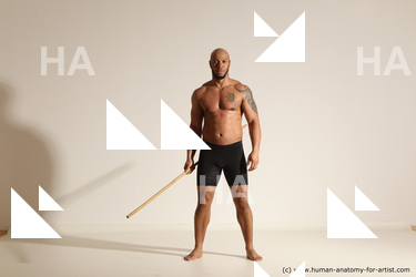 Sportswear Man Black Muscular Bald Dynamic poses Academic