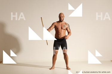 Sportswear Man Black Muscular Bald Dynamic poses Academic