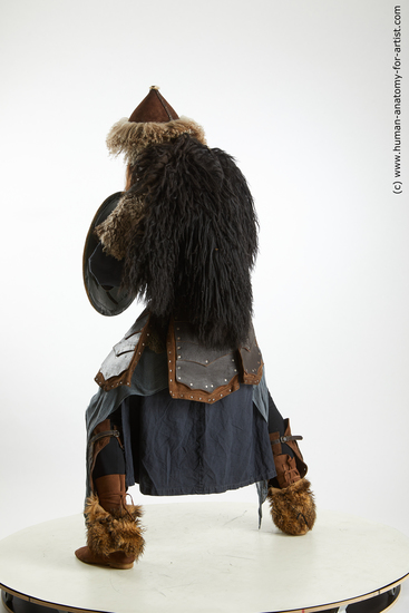 Fighting with axe Man White Average Long Brown Standard Photoshoot Academic