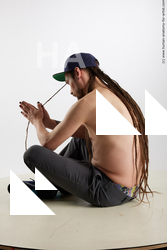 Casual Man White Sitting poses - simple Average Brown Sitting poses - ALL Dreadlocks Standard Photoshoot Academic