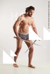 Underwear Fighting with sword Man Black Standing poses - ALL Muscular Long Black Standing poses - simple Standard Photoshoot Academic Fighting poses - ALL