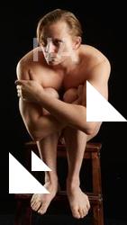 Sitting reference poses Stanley Johnson