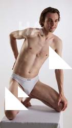 Kneeling reference poses Tony