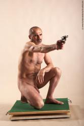 Nude Fighting with gun Man White Kneeling poses - ALL Slim Bald Kneeling poses - on one knee Realistic