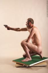 Nude Fighting with gun Man White Kneeling poses - ALL Slim Bald Kneeling poses - on one knee Realistic