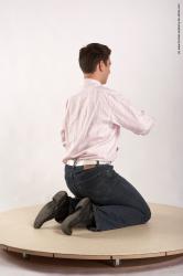 Casual Man White Kneeling poses - ALL Average Short Brown Academic