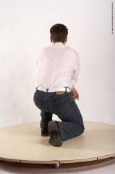 Casual Man White Kneeling poses - ALL Average Short Brown Kneeling poses - on one knee Academic