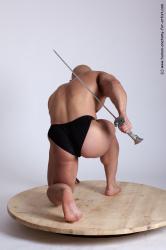 Swimsuit Fighting with sword Man White Kneeling poses - ALL Muscular Bald Kneeling poses - on one knee Academic
