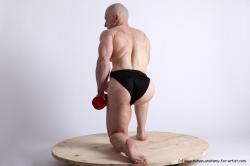 Swimsuit Man White Kneeling poses - ALL Muscular Bald Kneeling poses - on one knee Academic