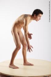 Nude Man White Standing poses - ALL Athletic Short Brown Standing poses - bend over Realistic