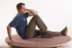 Casual Man White Sitting poses - simple Slim Short Brown Sitting poses - ALL Academic