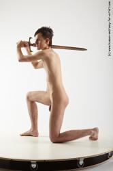 Nude Fighting with sword Man White Kneeling poses - ALL Slim Short Brown Kneeling poses - on one knee Realistic