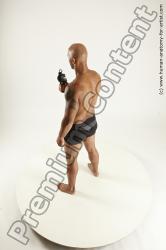 Underwear Fighting with gun Man Black Sitting poses - simple Muscular Bald Sitting poses - ALL Multi angles poses Academic