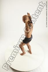 Underwear Fighting Man Black Sitting poses - simple Muscular Bald Sitting poses - ALL Multi angles poses Academic