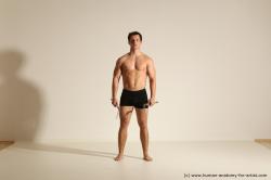 Underwear Fighting Man White Athletic Short Black Dynamic poses Academic