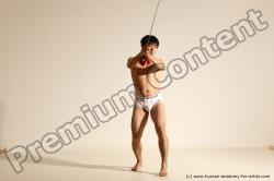 Underwear Fighting Man Asian Athletic Short Black Dynamic poses Academic