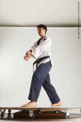 Sportswear Fighting Man Asian Slim Short Black Multi angles poses Academic