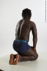 Underwear Man Black Kneeling poses - ALL Muscular Medium Kneeling poses - on both knees Black Standard Photoshoot Academic