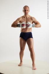 Underwear Fighting Man White Average Bald Standard Photoshoot Academic
