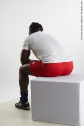 Sportswear Man Black Sitting poses - simple Muscular Medium Black Sitting poses - ALL Standard Photoshoot Academic