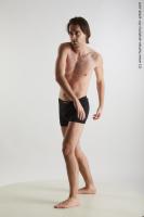 Photo Reference of standing reference pose chadwick