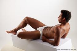 Swimsuit Man Black Laying poses - ALL Athletic Short Laying poses - on back Black Standard Photoshoot Academic