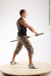 Casual Fighting with sword Man White Standing poses - ALL Athletic Short Brown Standing poses - simple Standard Photoshoot Academic Fighting poses - ALL