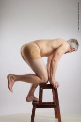 Underwear Man White Kneeling poses - ALL Athletic Short Grey Kneeling poses - on one knee Standard Photoshoot Academic