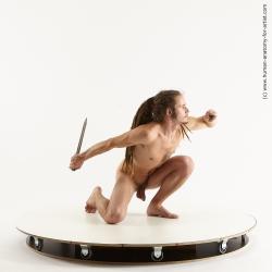 Nude Fighting with knife Man White Kneeling poses - ALL Athletic Brown Kneeling poses - on one knee Dreadlocks Standard Photoshoot Realistic Fighting poses - ALL