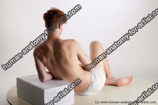 sitting reference feral 04